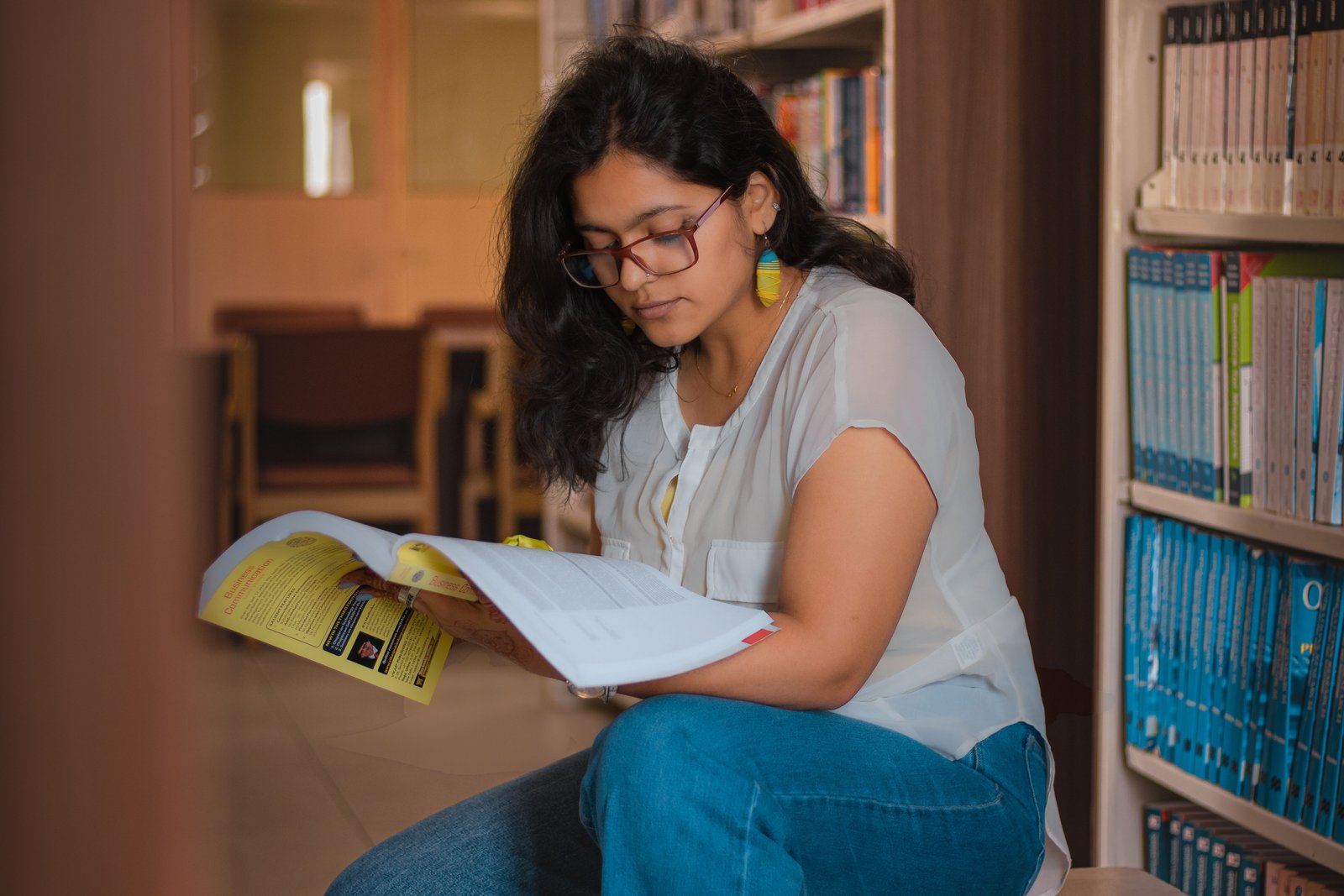 A medical student working through question-bank practice at a desk.