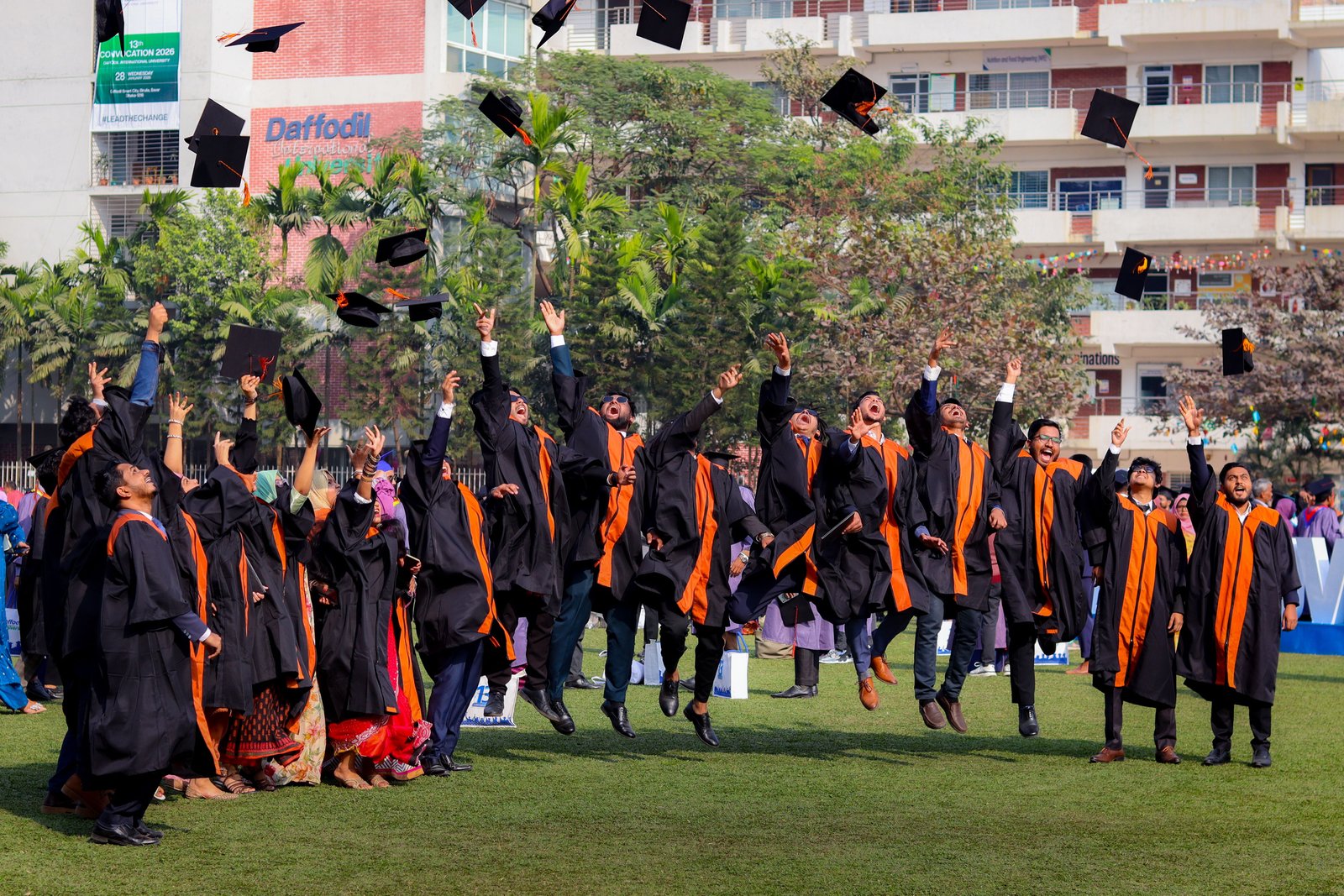 A group of friends celebrating together after exam results.